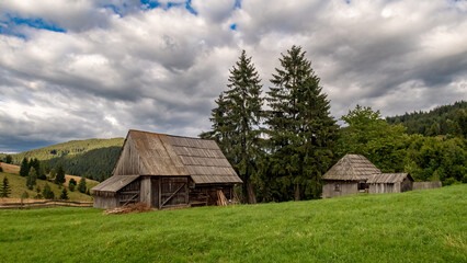 Fototapeta premium Old Farm in the carpathians of Romania
