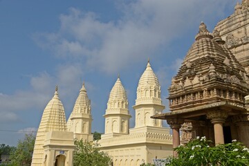 Fototapeta premium A serene Jain temple with intricate carvings and statues, radiating peace and spirituality. at Shantinath Jain temple Khajuraho, Madhya Pradesh, India