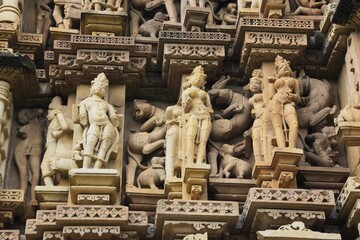 Fototapeta na wymiar A collection of intricate sculptures and carvings showcasing exquisite craftsmanship., Khajuraho Building complex in Madhya Pradesh 