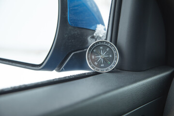 Compass inside the car.