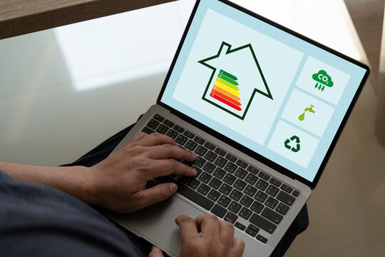 Energy Efficient House man use house icon with energy efficiency scale Invoice And Economy