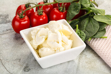 Soft cream cheese in the bowl
