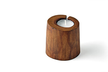 Cracked sawn wood candle holder and pillar candles isolated on a white background