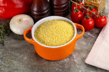 Raw dry wheat couscous grain