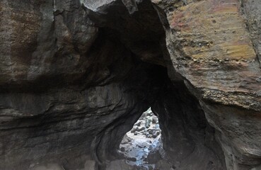 Unique rock formation with layers of sedimentary rock, showcasing natural beauty and geological history. at Pachmarhi, Madhya Pradesh, India