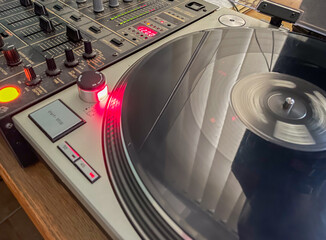turntable playing vinyl record music