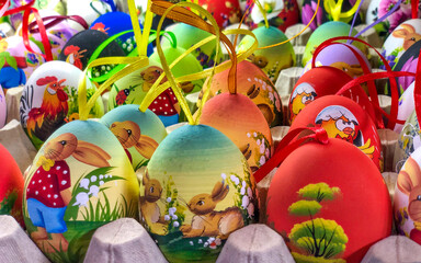 Fototapeta na wymiar Colorful Easter Eggs in a straw basket