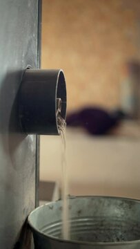 Close-up of dust spilling out of a carpet beating machine in production. Professional carpet cleaning