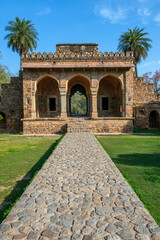 Fototapeta na wymiar The Isa Khan Garden Tomb at Delhi India. This octagonal tomb known for its sunken garden was built for a noble in the Humayun's Tomb complex.