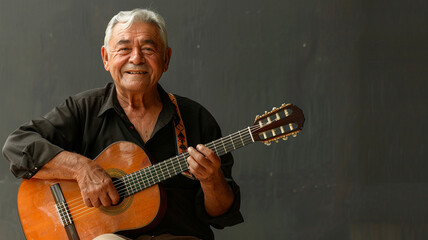 a happy senior man playing the guitar