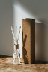 Elegant Reed Diffuser With Shadows on Wooden Surface in Soft Morning Light - 763898721