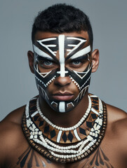 Obraz premium The image presents a man's sturdy neck embellished with an elaborate tribal necklace featuring intricate beaded patterns