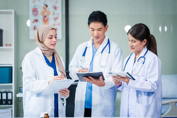 Hospital medical multi ethics people group meeting team in office with nurse students for vaccination education, talk event in clinic room. holding tablet and clipboard.