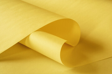 A large long sheet of paper in a warm vintage color as a background.