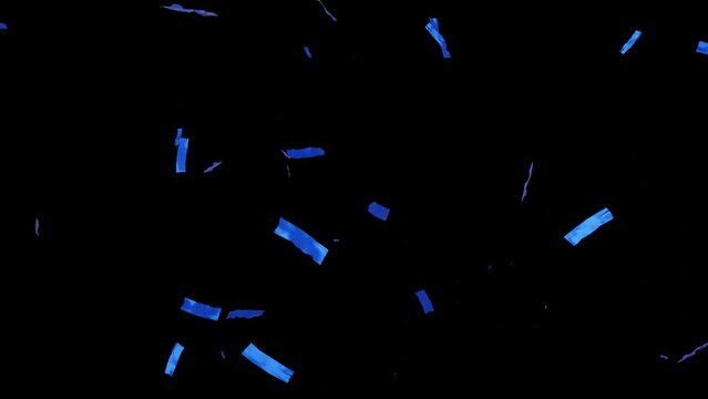 Falling shiny blue confetti isolated on transparent video black background. Bright festive tinsel of blue color