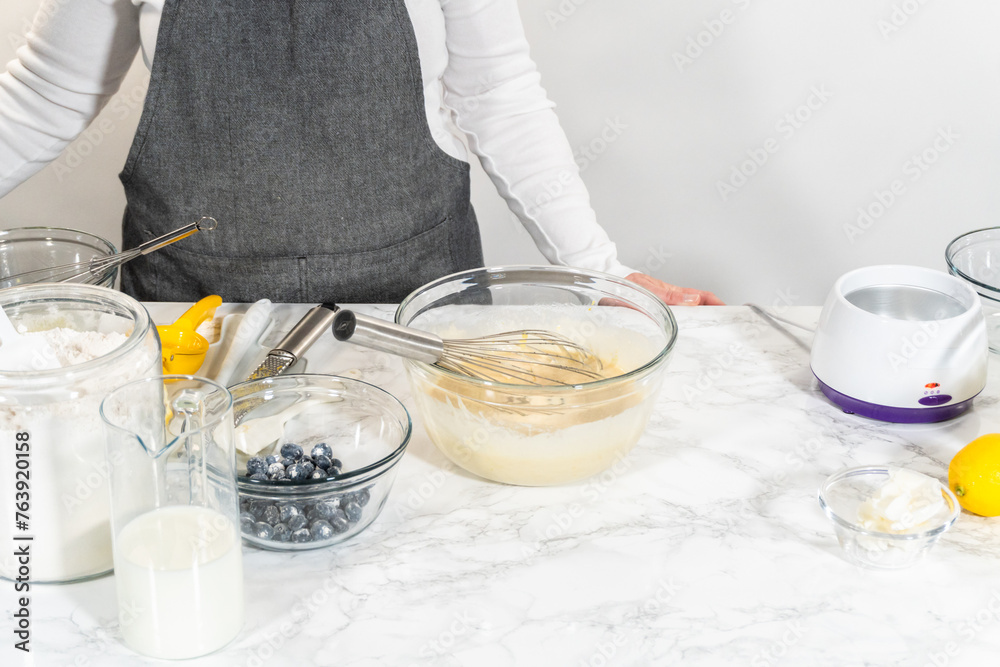 Wall mural crafting lemon, blueberry, and vanilla bundt cakes