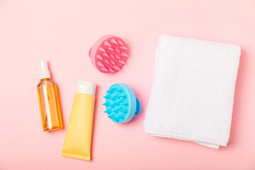 Brush for scalp massage on background. Brush for hair growth stimulating brush. Hair massage. stimulating brush. Hair care, head relaxation concept. Copy space.