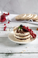 Rice cakes, healthy food.
on a wooden background. Breakfast