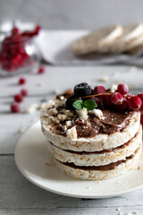 Rice cakes, healthy food.
on a wooden background. Breakfast