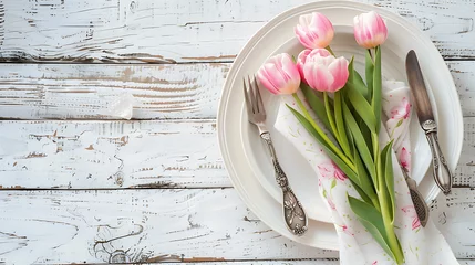 Foto op Aluminium  Easter table setting featuring pink tulips arranged on a white wooden background © Iqra Iltaf