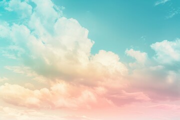 Pastel colored clouds in a soft blue sky at sunset, offering a dreamy and peaceful backdrop - obrazy, fototapety, plakaty