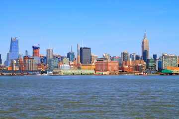 Manhattan Skyline in New York City, NY. Manhattan is the most densely populated borough of New York City