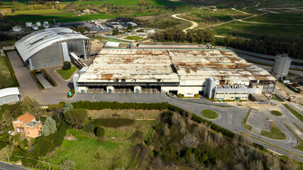 Aerial view an old abandoned hangar.