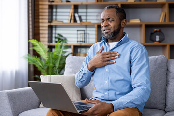 A male patient engages in a virtual consultation, seeking medical guidance from a healthcare...