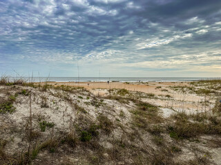 Sweeping beach landscape on a cloudy day: Anastasia State Park Beach, St. Augustine, Florida