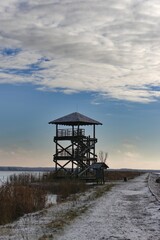 Fototapeta na wymiar lookout tower by the lake