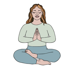 Woman sitting on the floor in a yoga pose.