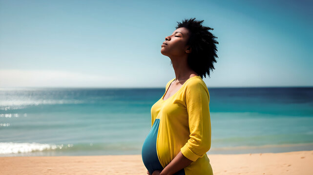 Pregnant African woman breathing air deeply caressing her belly, Happy black woman breathing air deeply while waiting for the birth of her baby