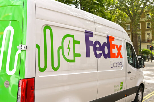 London, England, UK - 22 August 2023: Side view of an electirc delivery van used by the FedEx Express courier company.