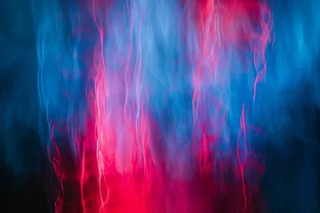 Foto op Aluminium Abstract background of red, blue and pink smoke in the dark © Cuong