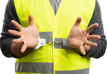 Close-up of builder thief wearing work vest with handcuffs