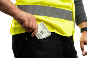 Close-up of builder wearing vest putting cash money in pocket