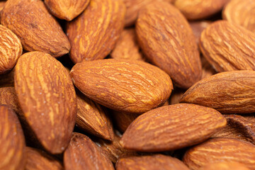 Fototapeta premium A lot of roasted nuts almond macro