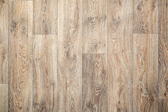 Background texture of wooden walnut parquet