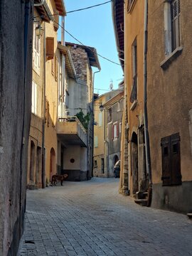 Old houses facing each other in a streef of an old town in France Europe