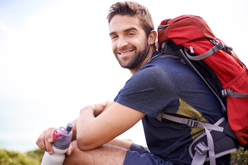 Man, hike and smile for adventure with water bottle or backpacker for fitness, workout and activity on mountain top. Portrait, happy and outdoor in nature for healthy mind in woods or forest. - obrazy, fototapety, plakaty