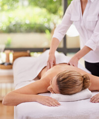 Obraz na płótnie Canvas Woman, hands and spa with massage therapist for luxury peace or stress relief at zen resort, calm or vacation. Female person, eyes closed and comfortable for healthy skincare, treatment or wellness