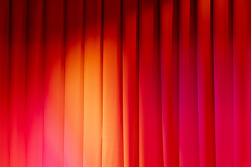 Red theatrical curtain with spot lights illumination, background