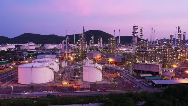 Aerial view footage B roll light oil terminal is industrial facility for storage of oil and petrochemical. oil manufacturing products. power electric plant. low light. Footage b roll drone shot 4k.