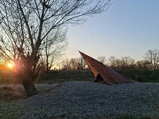 Tarp shelter camping sunset