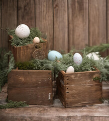 Rustic Easter Charm. A rustic vignette featuring weathered wooden crates