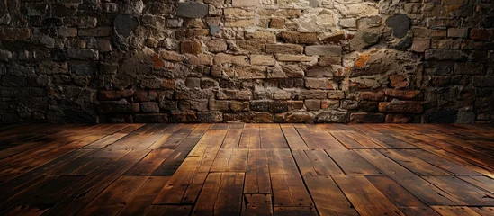Poster An empty room with a hardwood plank flooring and a bedrock stone wall creating a rustic and natural landscape inside © 2rogan