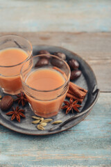 Traditional indian drink - masala tea - 764037115