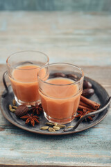 Traditional indian drink - masala tea - 764037136