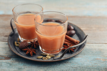 Traditional indian drink - masala tea - 764037155