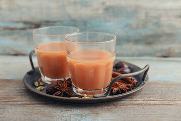 Traditional indian drink - masala tea - 764037157